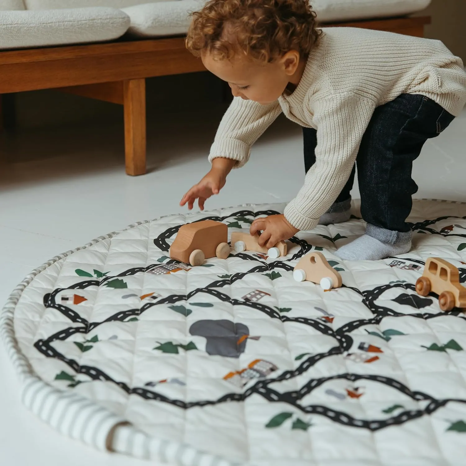 Blooom 2-in-1 Quilted Baby Play Mat & Storage Bag | Portable, Soft, and Convenient | Perfect for Travel & On-The-Go | Portable Play Mat for Baby & Toddler | Oekotex Cotton (City, 47 Inches)