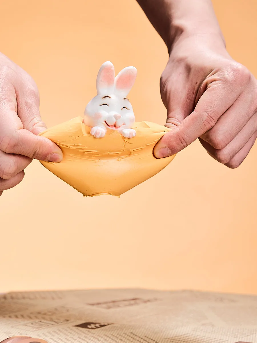 Bunny in Orange Easter Egg Squeeze Toys
